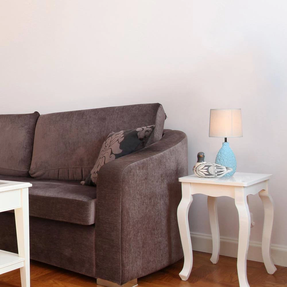 14 in. Blue Textured Stucco Ceramic Oval Table Lamp by Simple Designs 7 14 in. Blue Textured Stucco Ceramic Oval Table Lamp by Simple Designs - Image 7