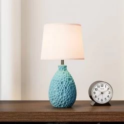 14 in. Blue Textured Stucco Ceramic Oval Table Lamp by Simple Designs 9 14 in. Blue Textured Stucco Ceramic Oval Table Lamp by Simple Designs -Simple Designs Online Shop blue simple designs table lamps lt2003 blu 40 1000